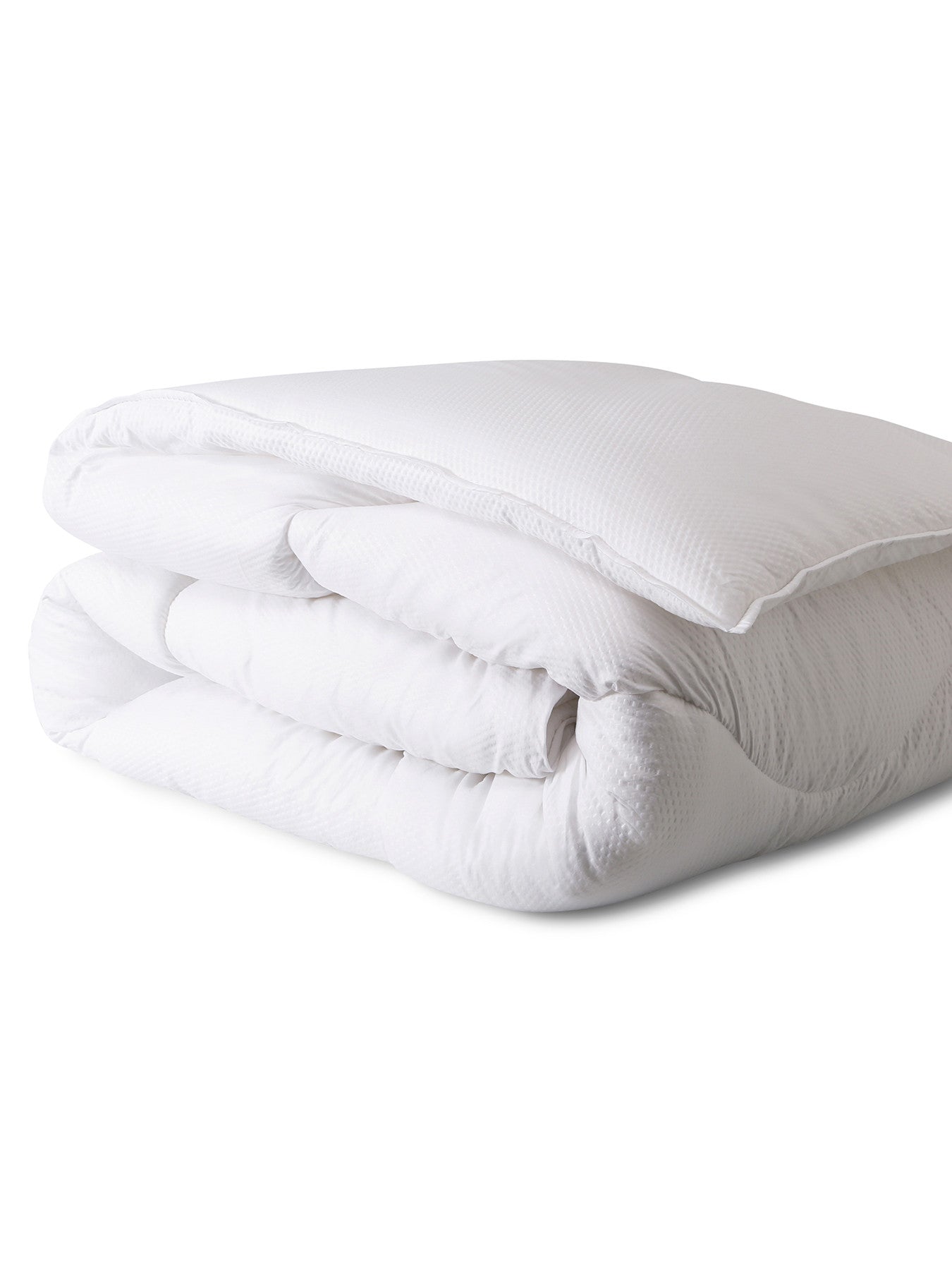 A folded white duvet cover displayed on a neutral background.
