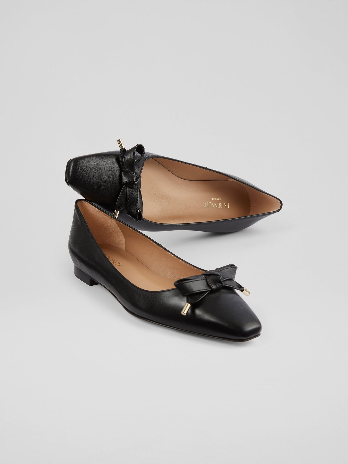 Black Mabel Black Nappa Leather Eyelet Bow Flat