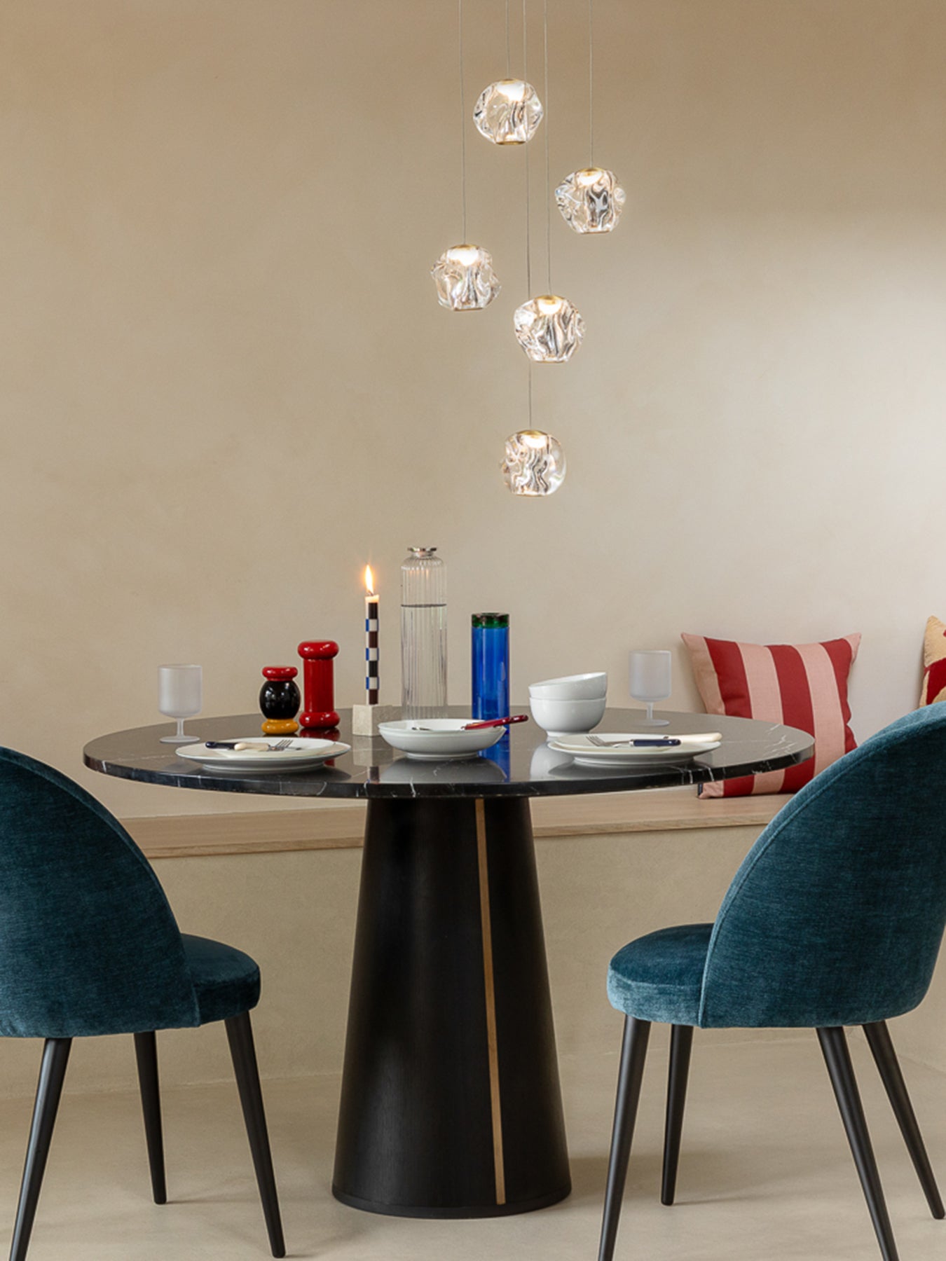 Black marble totem pedestal dining table