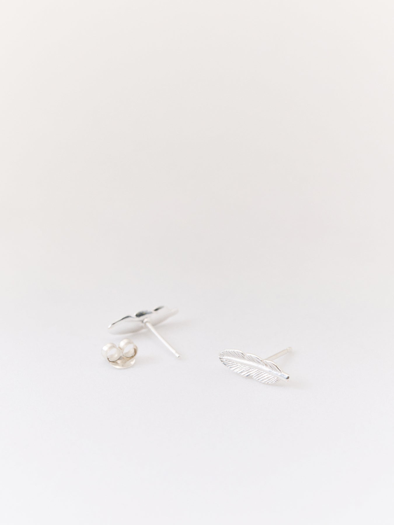 Tiny Feather Stud Earrings Silver