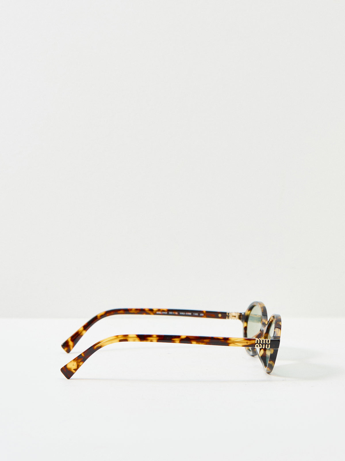 0MU 04ZS Round Sunglasses Honey Havana