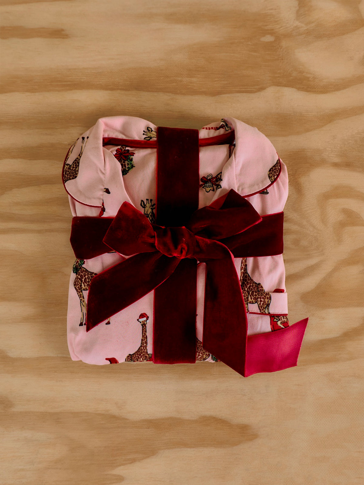 Festive Giraffes Long Pyjama Set - Pink
