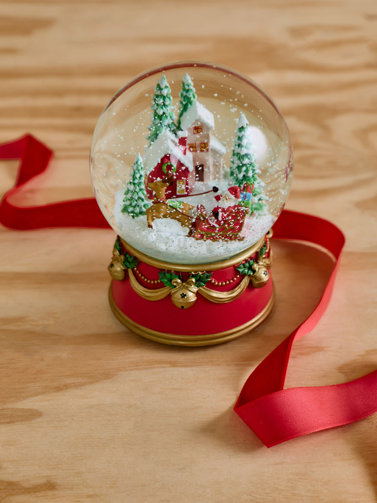 Musical Santa Sleigh & Village Snow Globe 16cm - Red