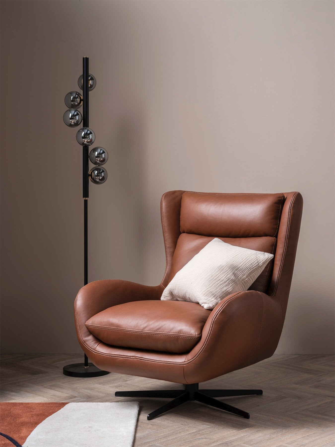 Uma Brown Leather Swivel Armchair