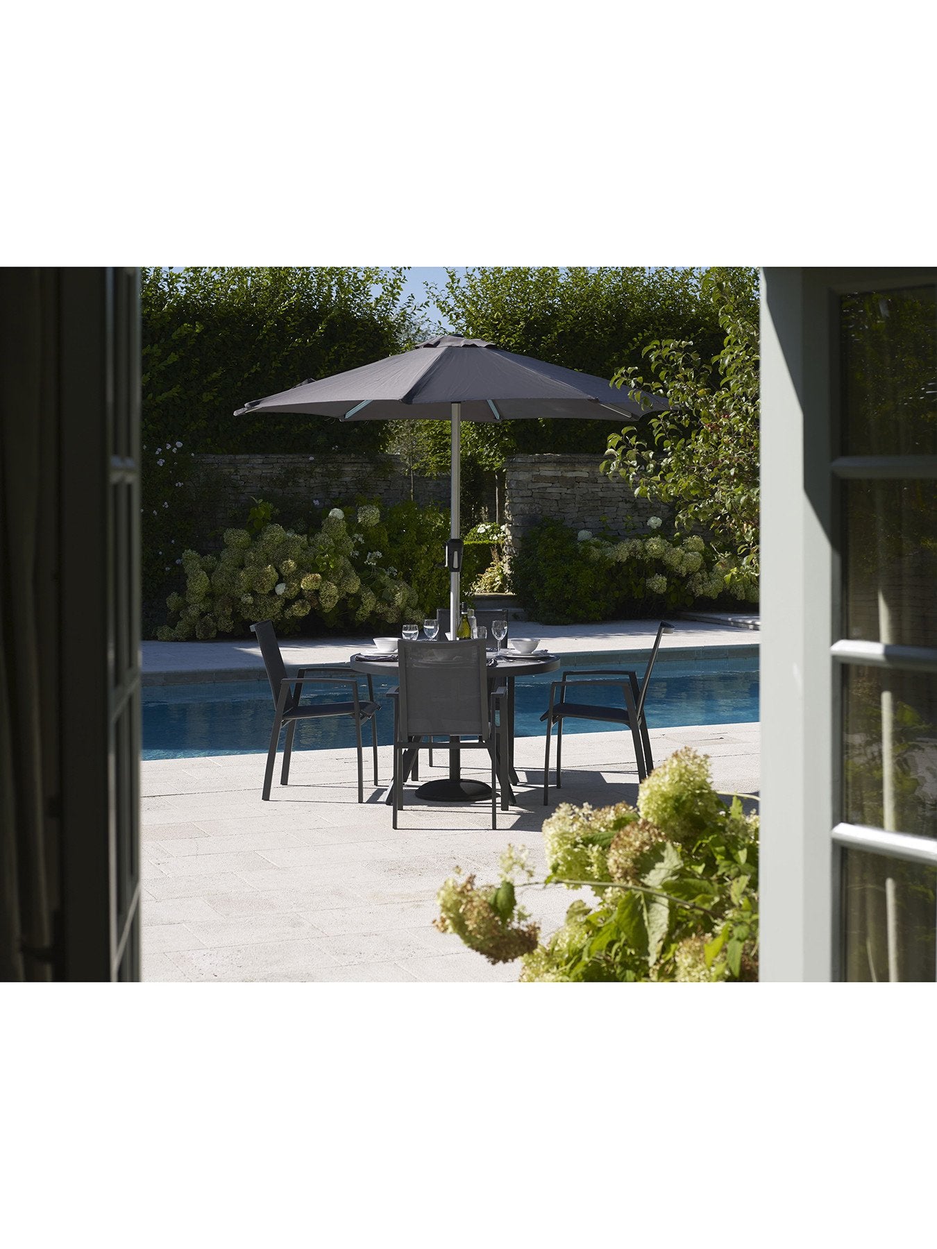 Seville Round 4 Seat Dining Table with Parasol an