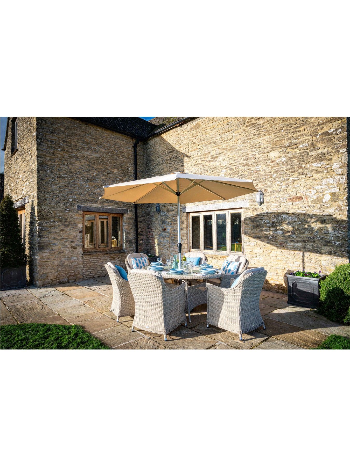 Monterey Rattan 6 Seat Elliptical Dining Set with Parasol & Base