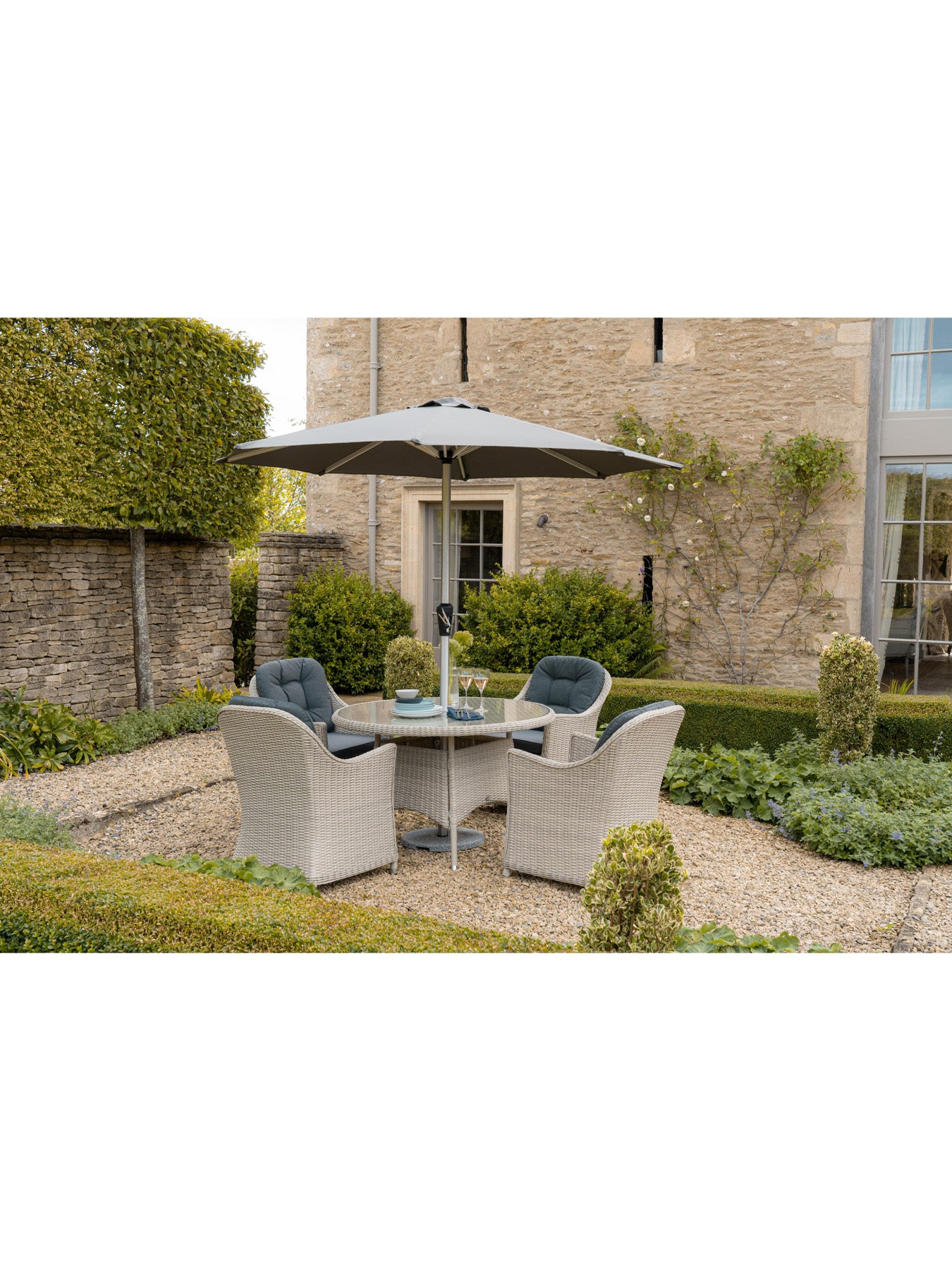 Monterey Rattan 4-Seat Round Dining Set with Parasol & Base