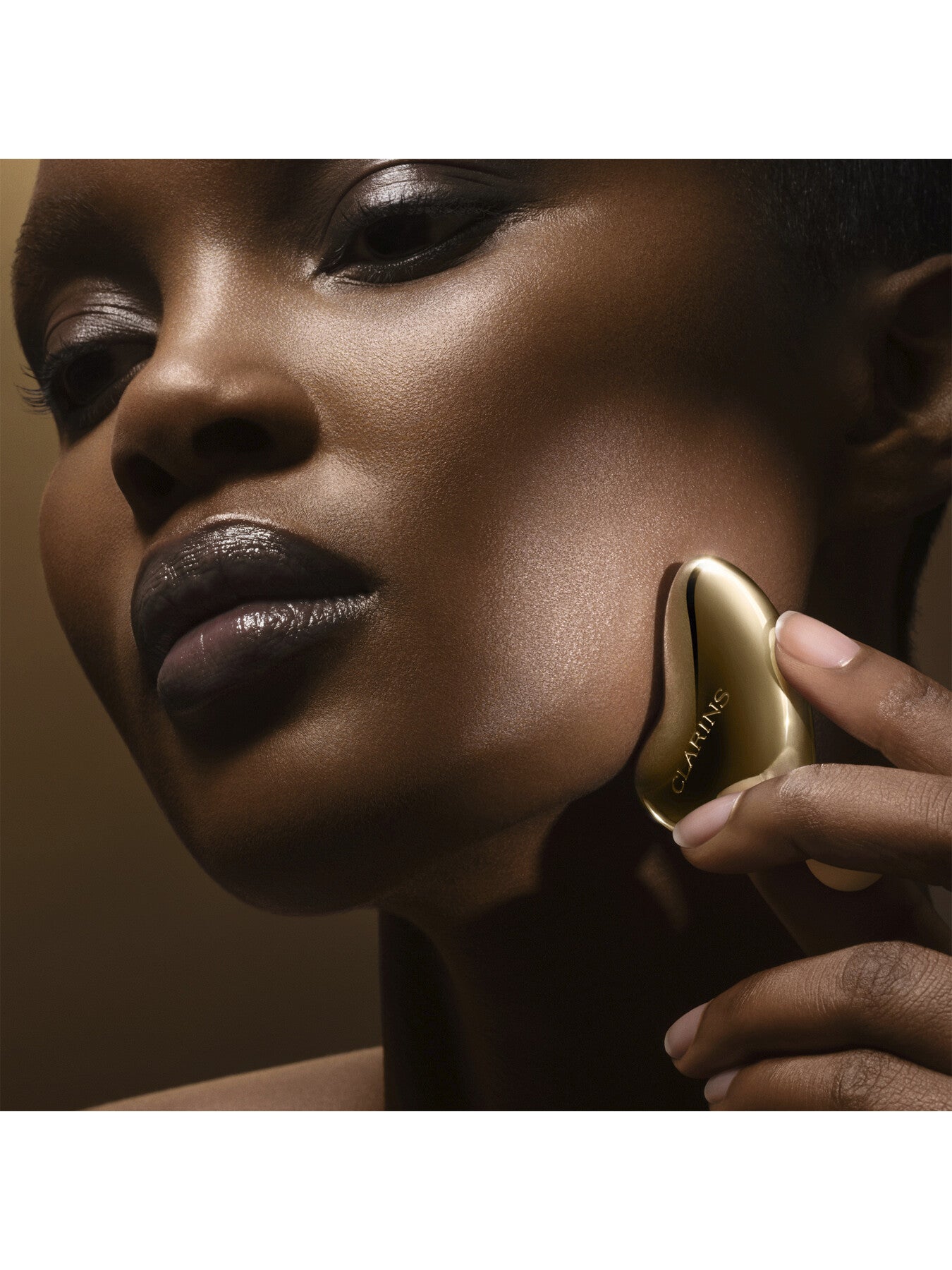 Clarins Precious LOutil 3-in-1 Facial Massage Tool