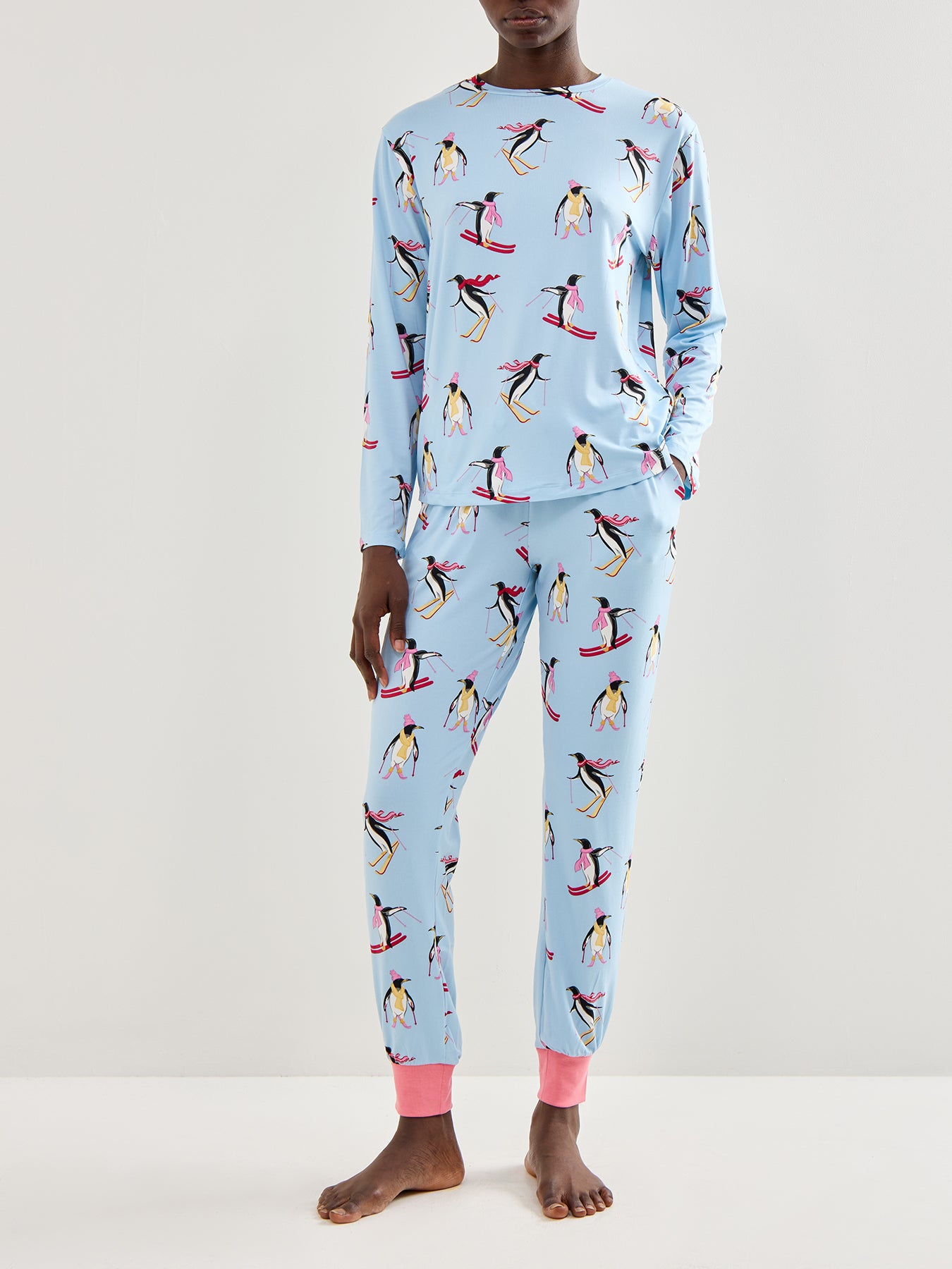Skiing Penguins Pyjama Set Blue