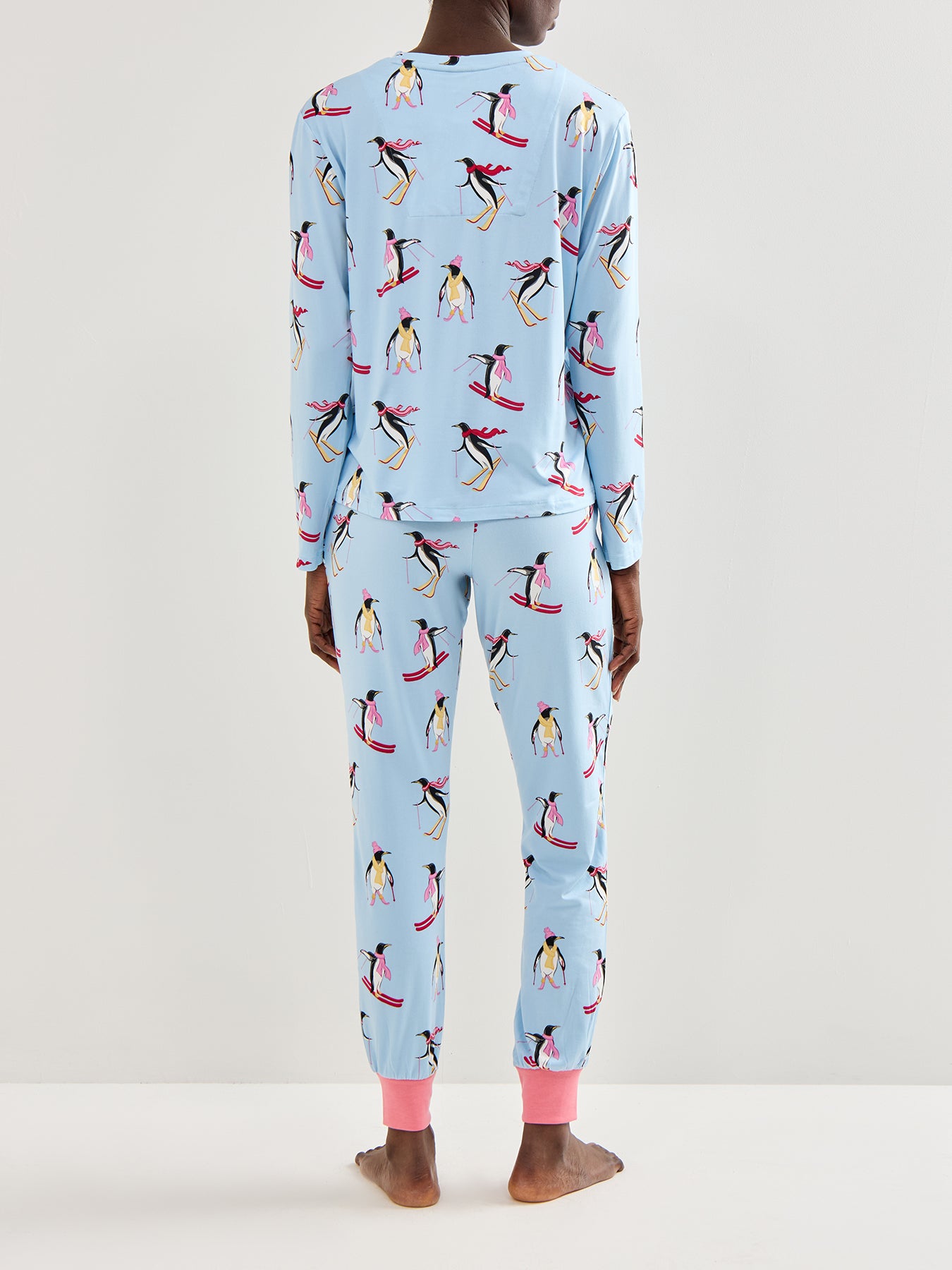 Skiing Penguins Pyjama Set Blue