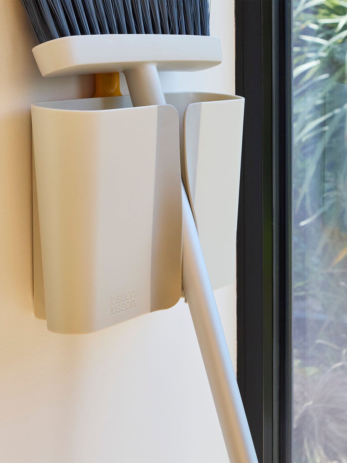 CleanTech Wall-Mounted Broom