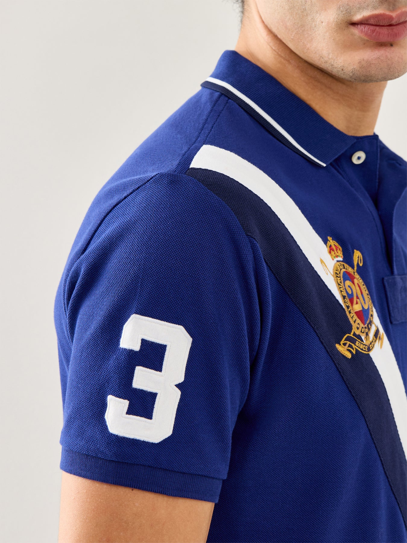 Diagonal Stripe 20Y Polo Top Blue