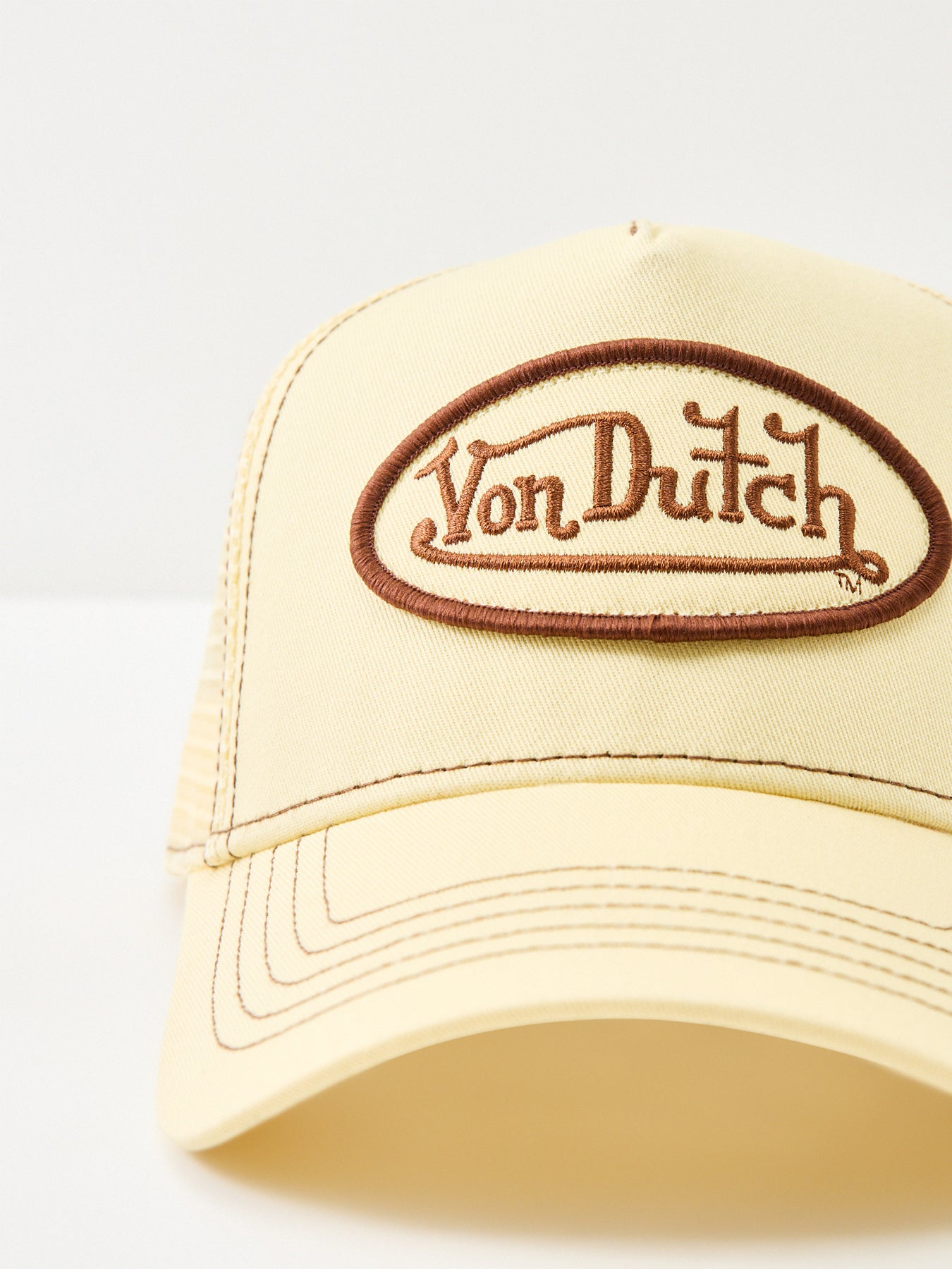 Solid Stitches Logo Trucker Cap Cream