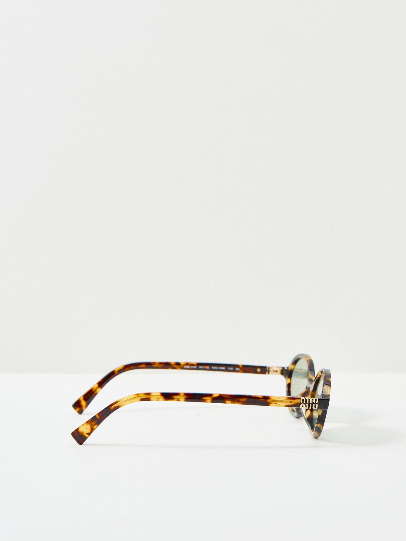 0MU 04ZS Round Sunglasses Honey Havana