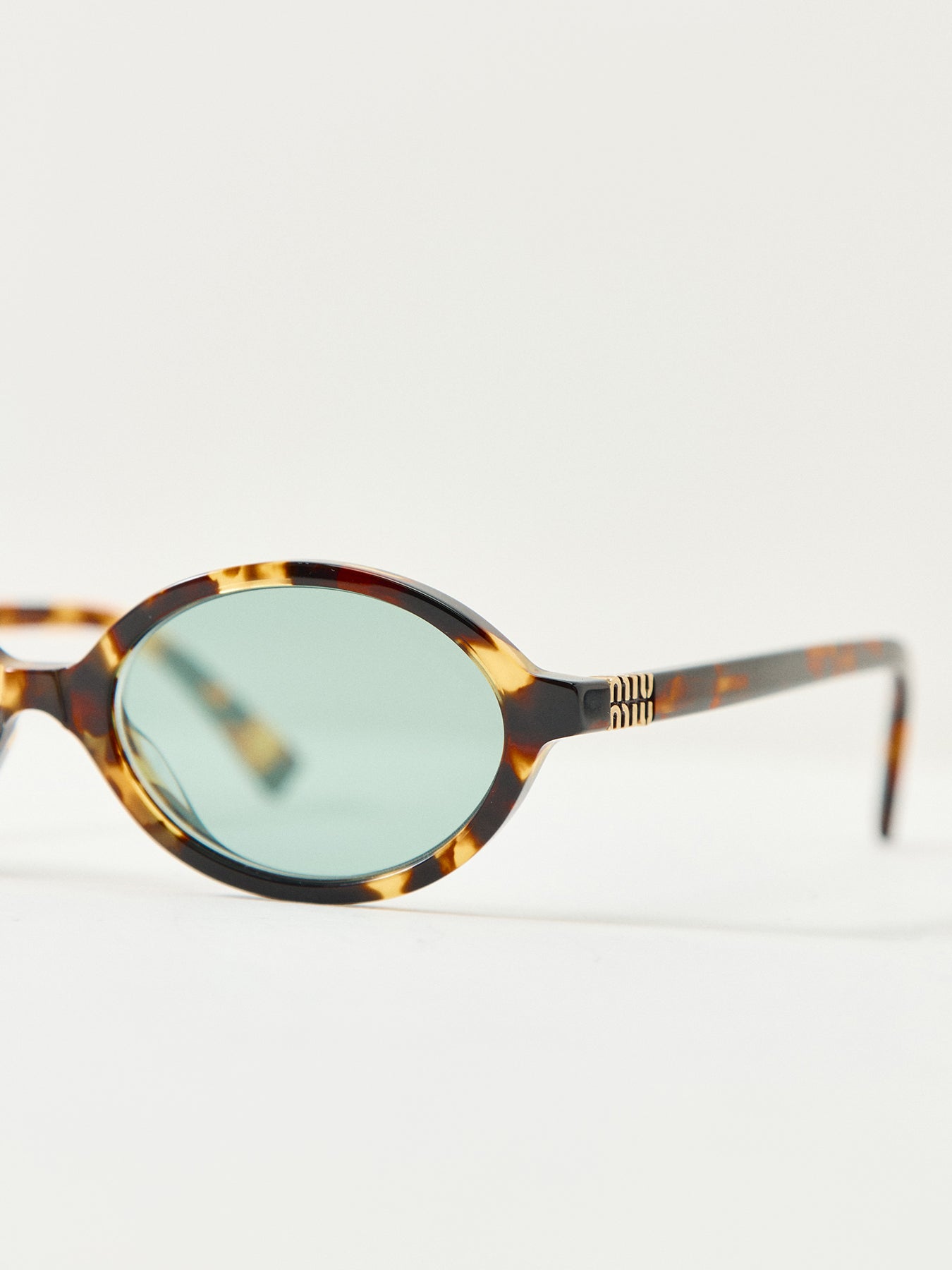 0MU 04ZS Round Sunglasses Honey Havana