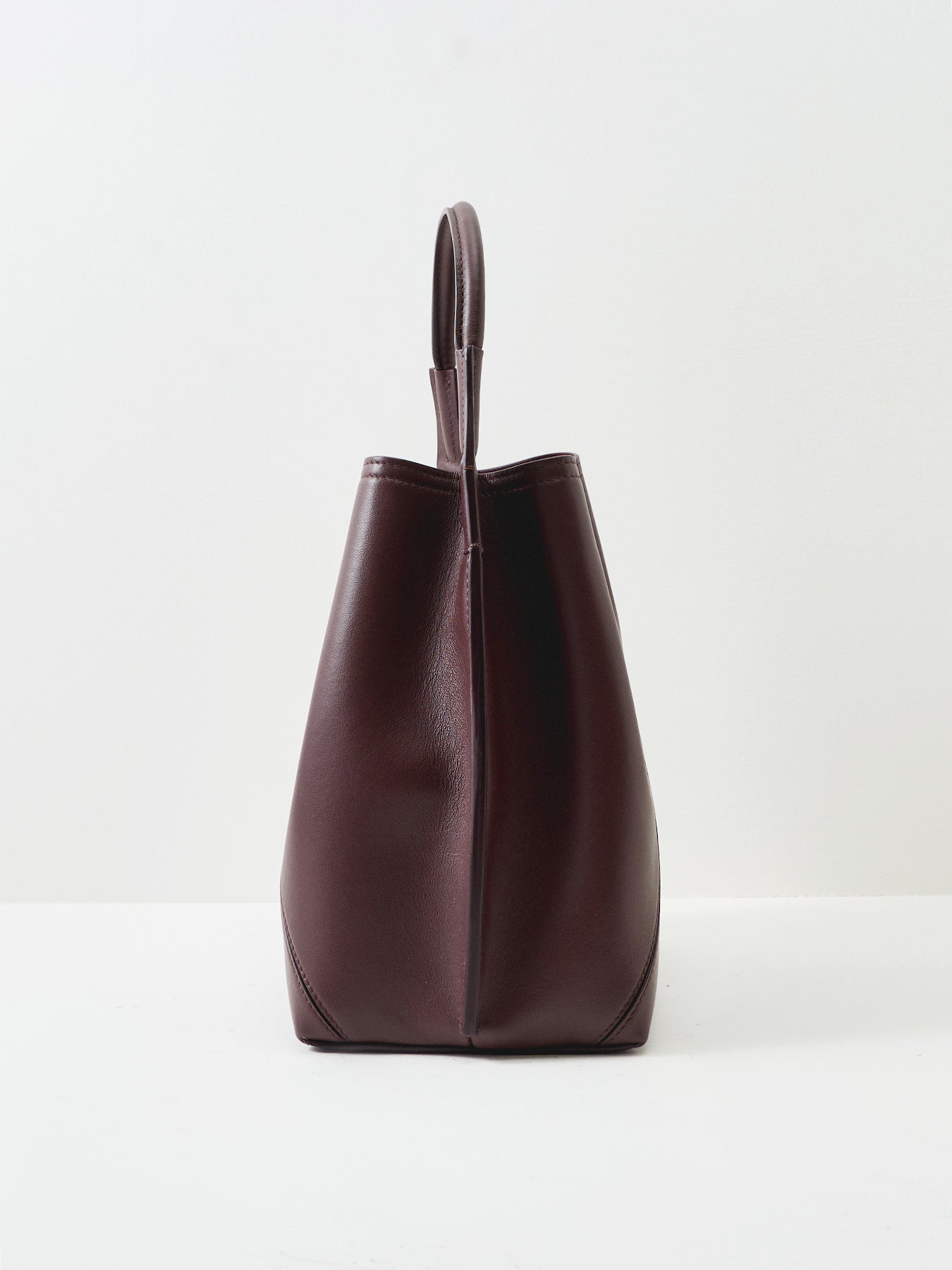 Victoria Plie Bucket Bag Burgundy