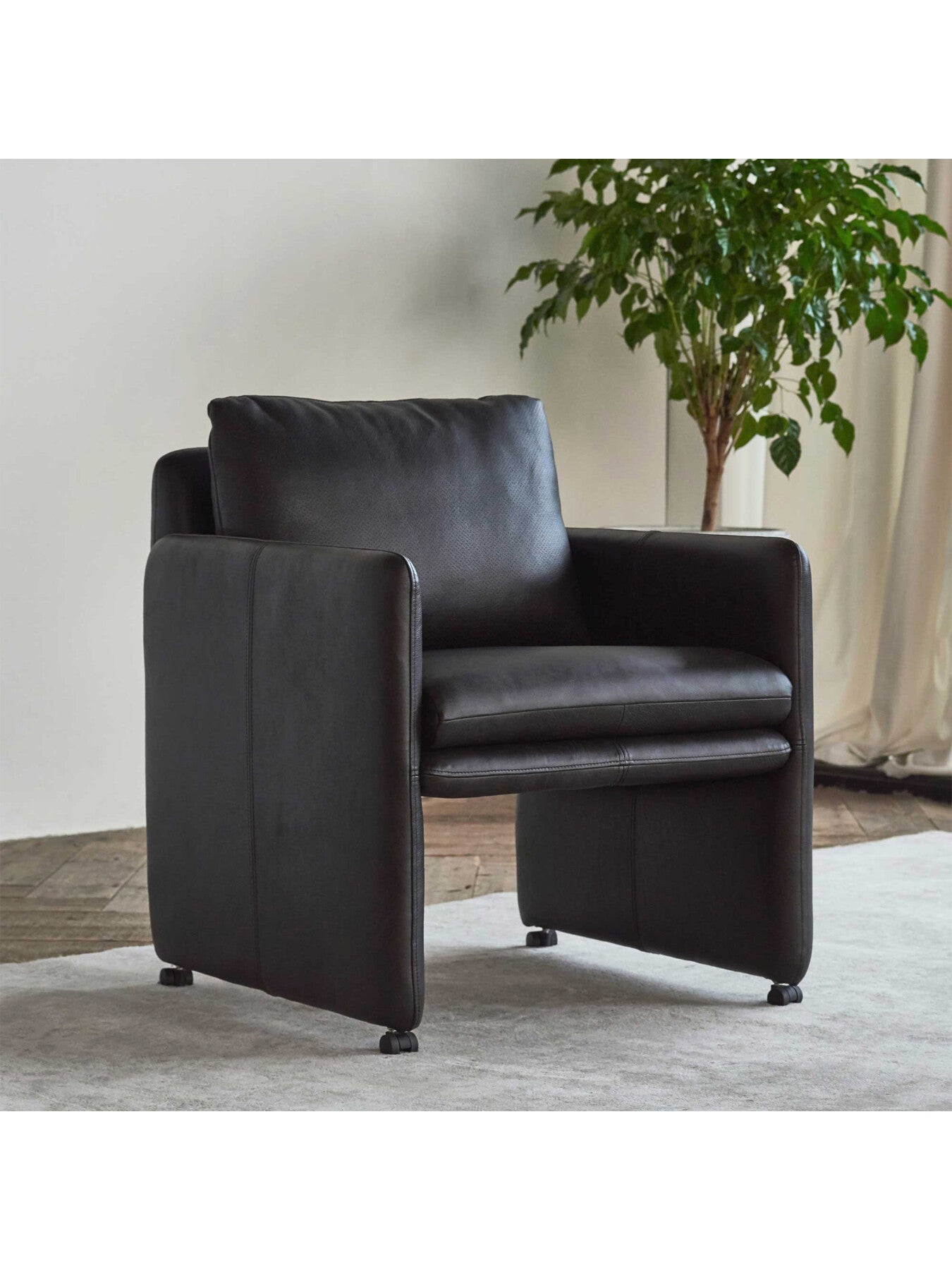 Brown Casca Dark Brown Leather Armchair On Wheels